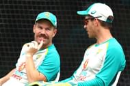 David Warner (L) chatting with skipper Tim Paine (R) during the latest nets session